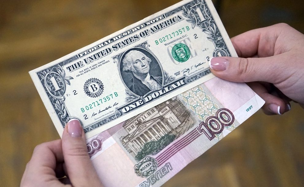Курс рубля к доллару в марте